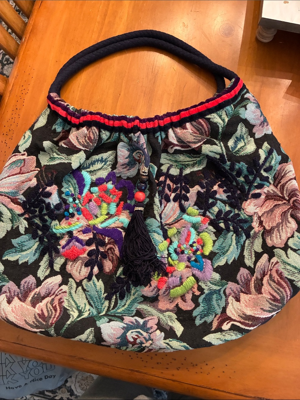 Black Floral Embroidered Hobo Bag with Tassel Accent